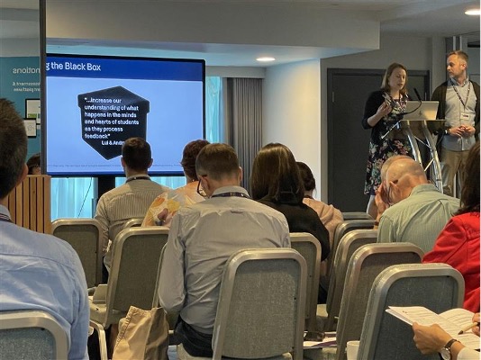 Photograph showing presentation at AHE 2025